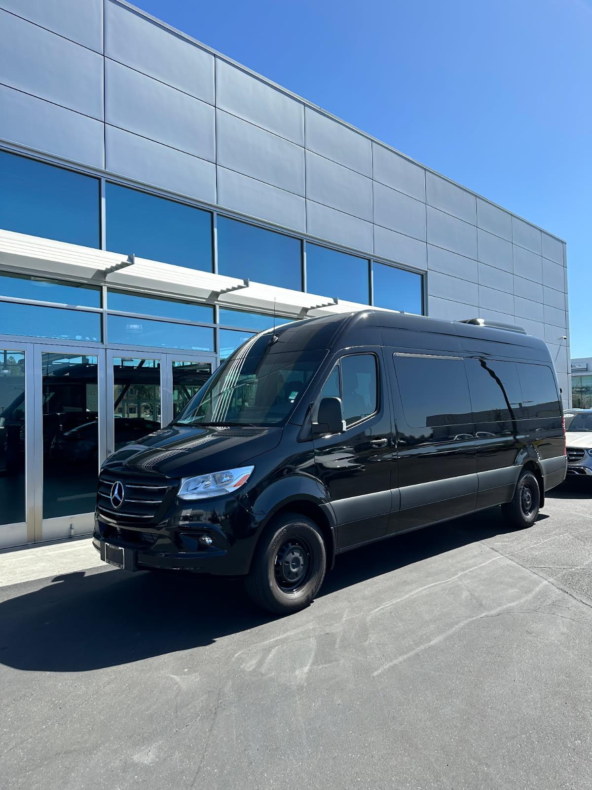 HTH black Mercedes-Benz Sprinter ready for private group transportation