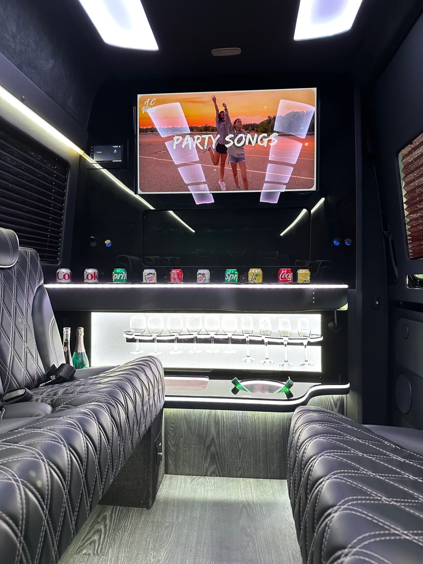 HTH Sprinter interior with premium seating and entertainment display