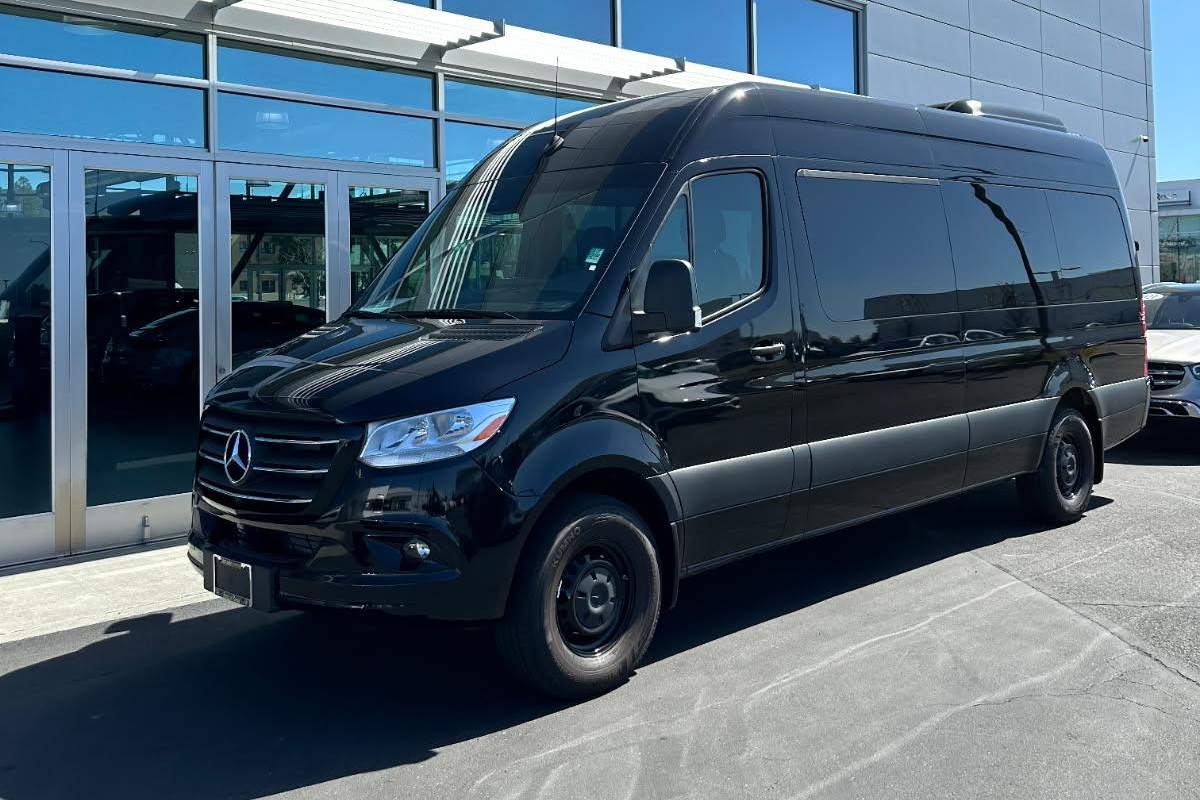 HTH black Mercedes-Benz Sprinter passenger van